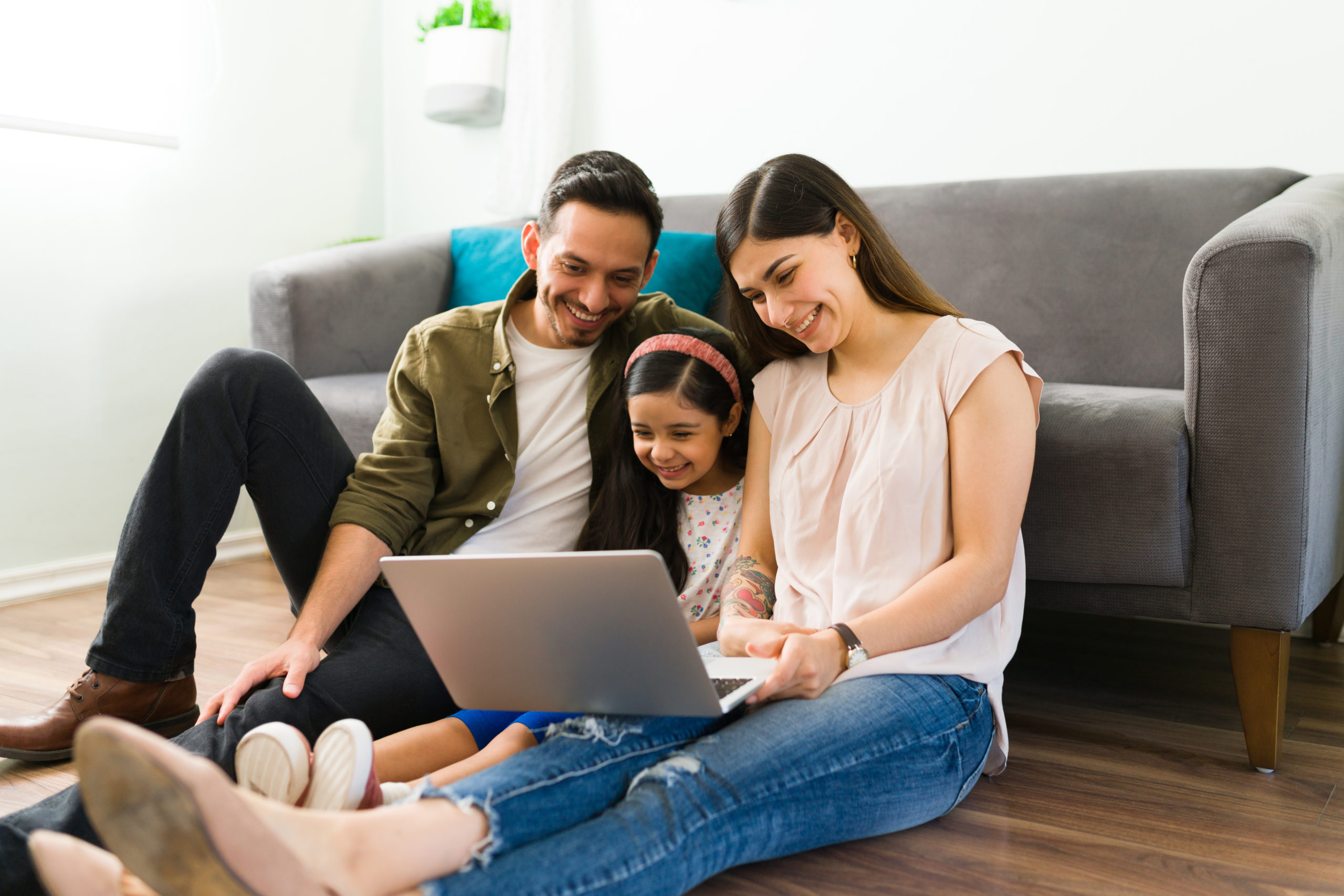 Parents and kid doing online shopping